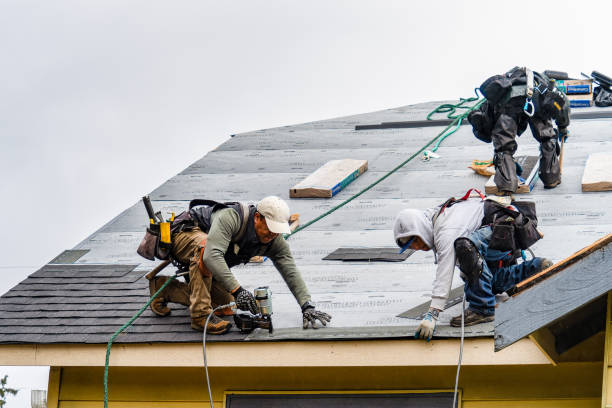Professional Roofing technician working in West Poland, ME
